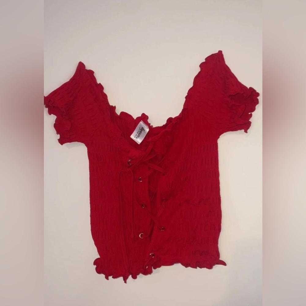 Red crop top with adjustable strings in the middle